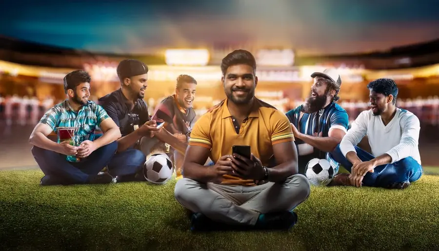 Indian cricket fans following live match odds on phones